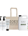 Zoey Naturals Newborn Essentials Bundle with baby skincare, laundry detergent, hand sanitizer and cotton tote